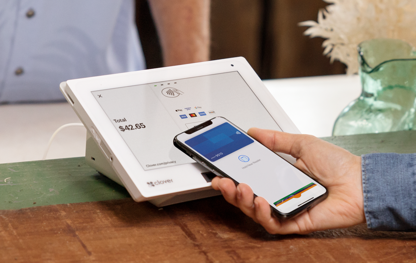 Retail POS terminal accepting an Apple Pay mobile payment
